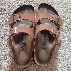 Birkenstock slightly used size 38. Bought on Europe trip. Beautiful soft shoetop